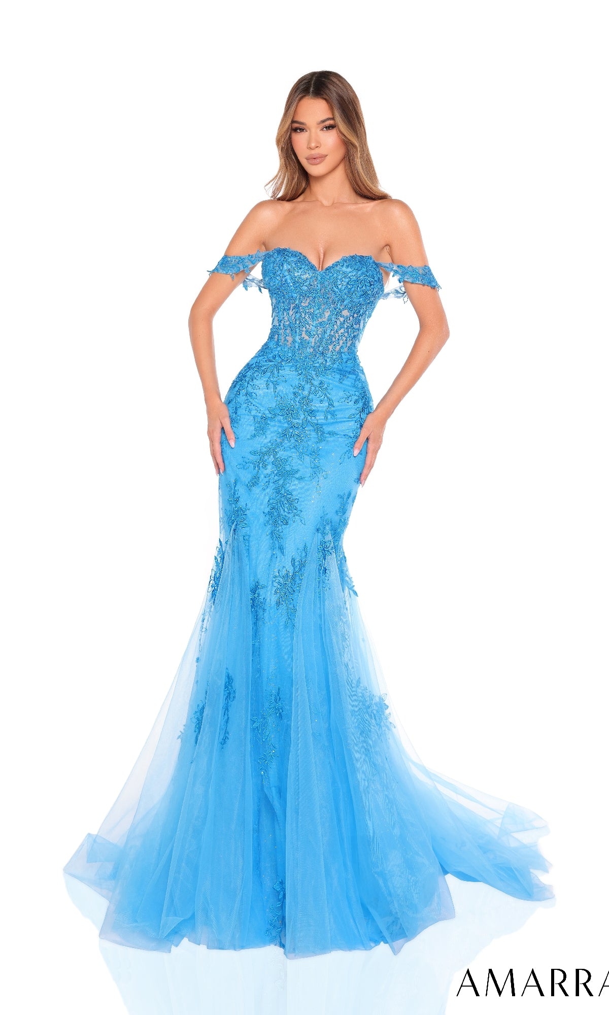A woman poses against a white background in the Amarra 88224 long prom dress?an off-shoulder blue mermaid gown with embroidered lace appliques, floral details, a corset bodice, and a tulle skirt.